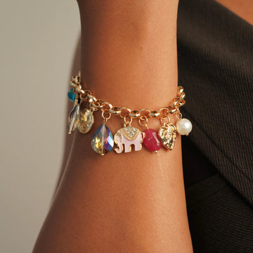 studded pink and pink elephant charm bracelet
